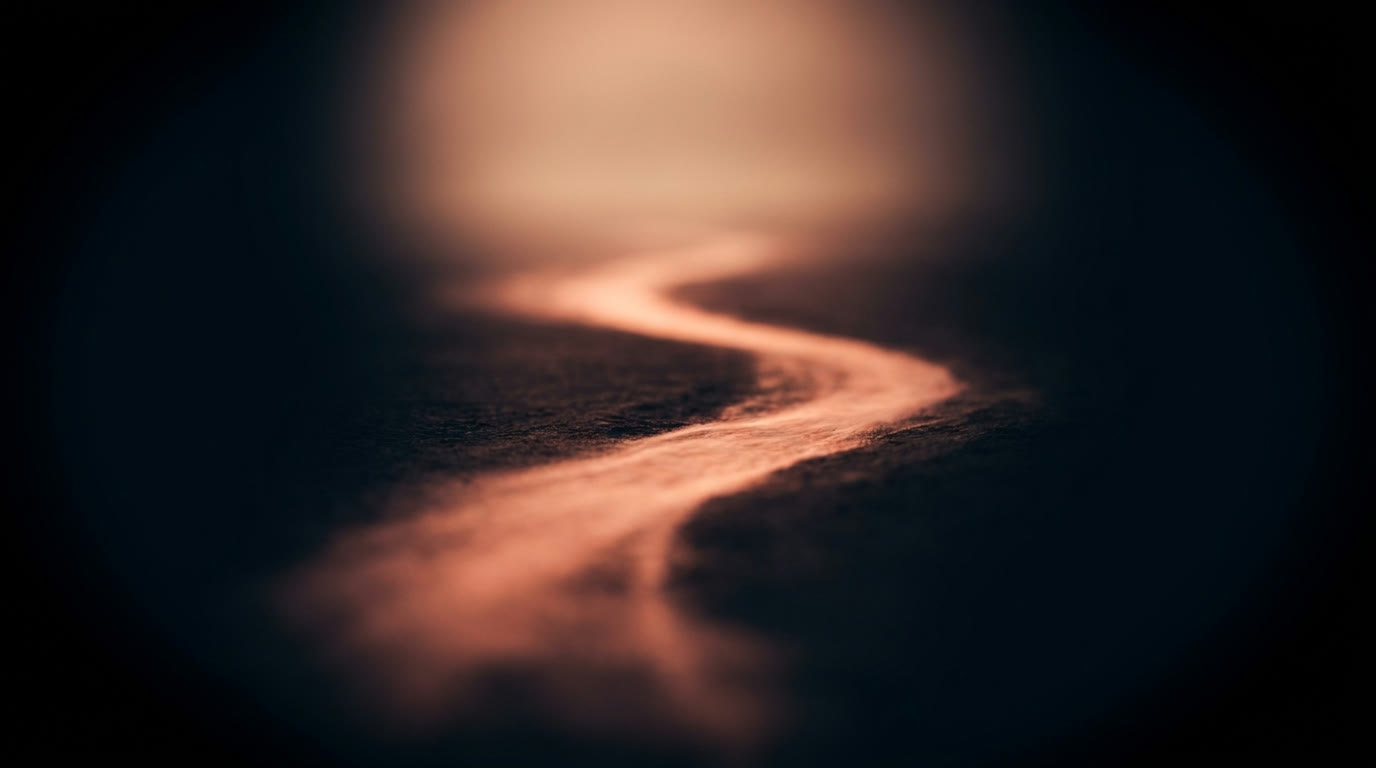 A single calm, clear path of warm light leading through deep darkness toward a soft glow.